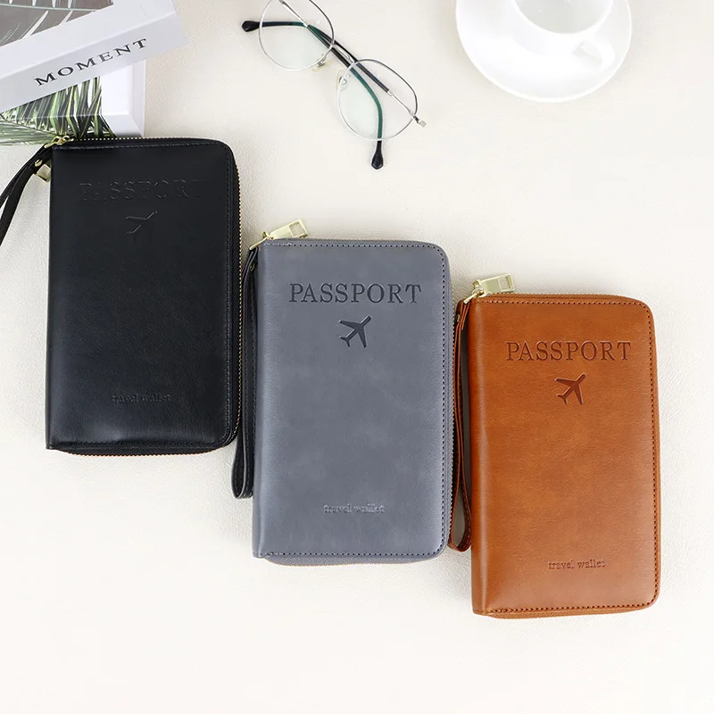 RFID blocking leather passport cover, suitable for women's large capacity travel wallets with multiple card slots