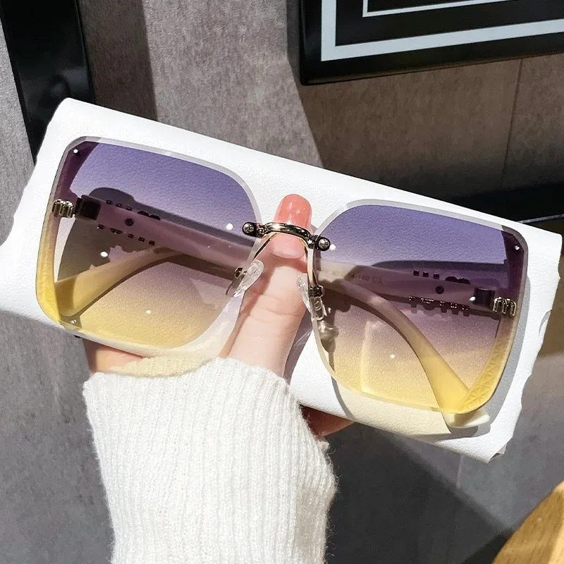 Luxury Women's Rimless Vintage Sunglasses with UV400 Protection