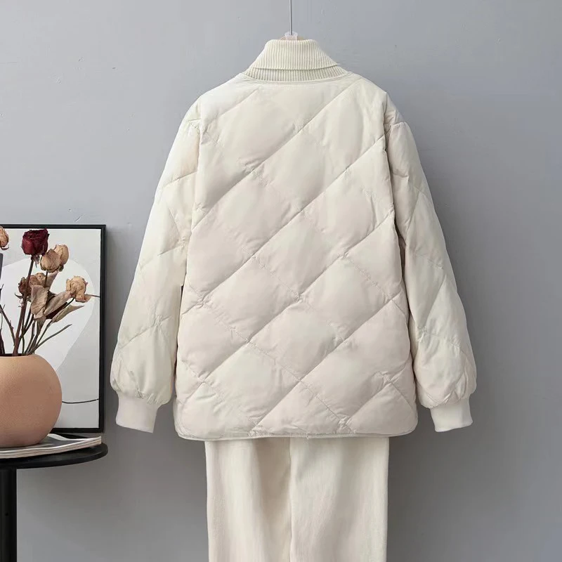 Рисунок 5 - Осень-зима 2023, короткая пуховая