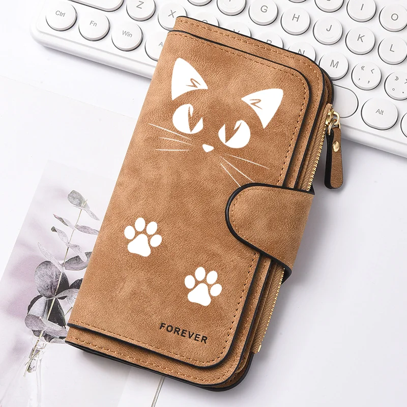 Featuring a cat motif this women's long wallet offers multiple card slots a coin pocket and a cell phone pouch A perfect gift