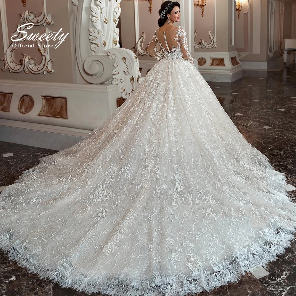 Abito da sposa di lusso pizzo ricamato su rete con abito da ballo o-collo manica intera abiti da sposa bottone Appliques Vestido De Novia