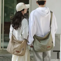 Sac à bandoulière japonais pour femmes et hommes, grands sacs messager en toile pour étudiants, sacs de livres de marque, sacoches à main féminines, 2024 1
