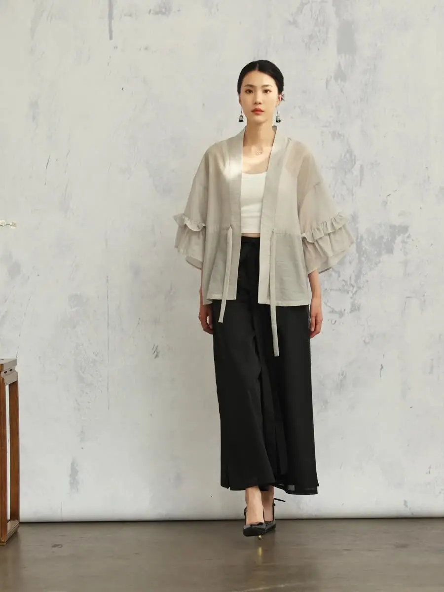 Оригинальная ранняя весна пригородная блузка с рюшами на рукавах высокое