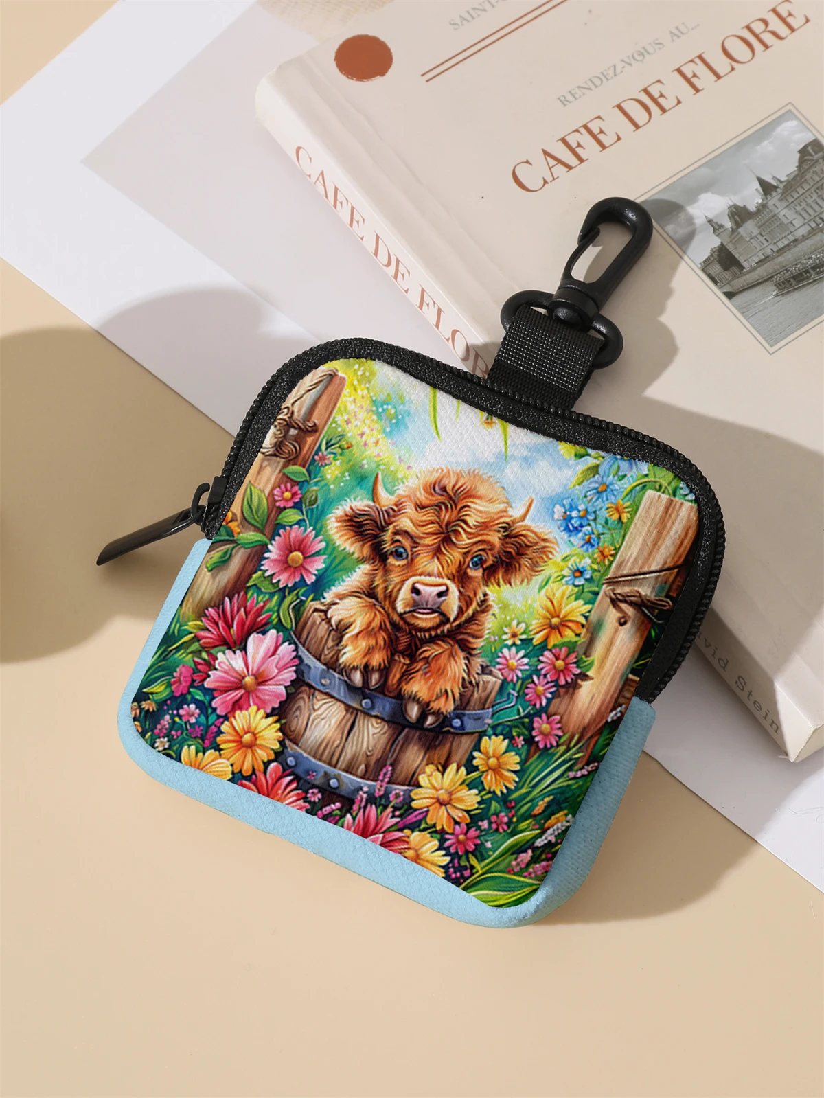 A large capacity coin wallet with a cow pattern, a digital printed coin wallet, and a storage bag are ideal choices for gifs