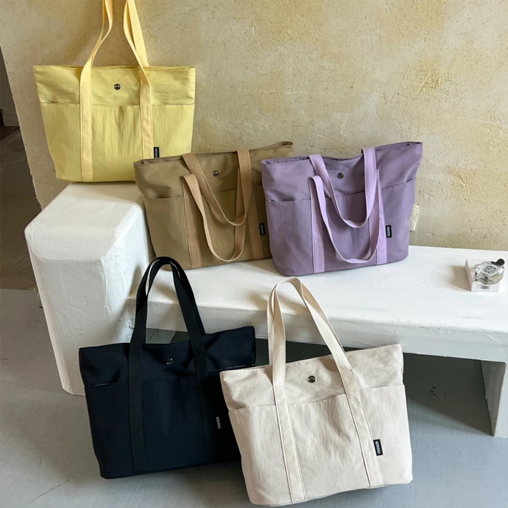 Borsa tote in tela casual, alla moda e di tendenza, con grande capacità, leggera, ideale per il pendolarismo, dal design semplice. - immagine 3