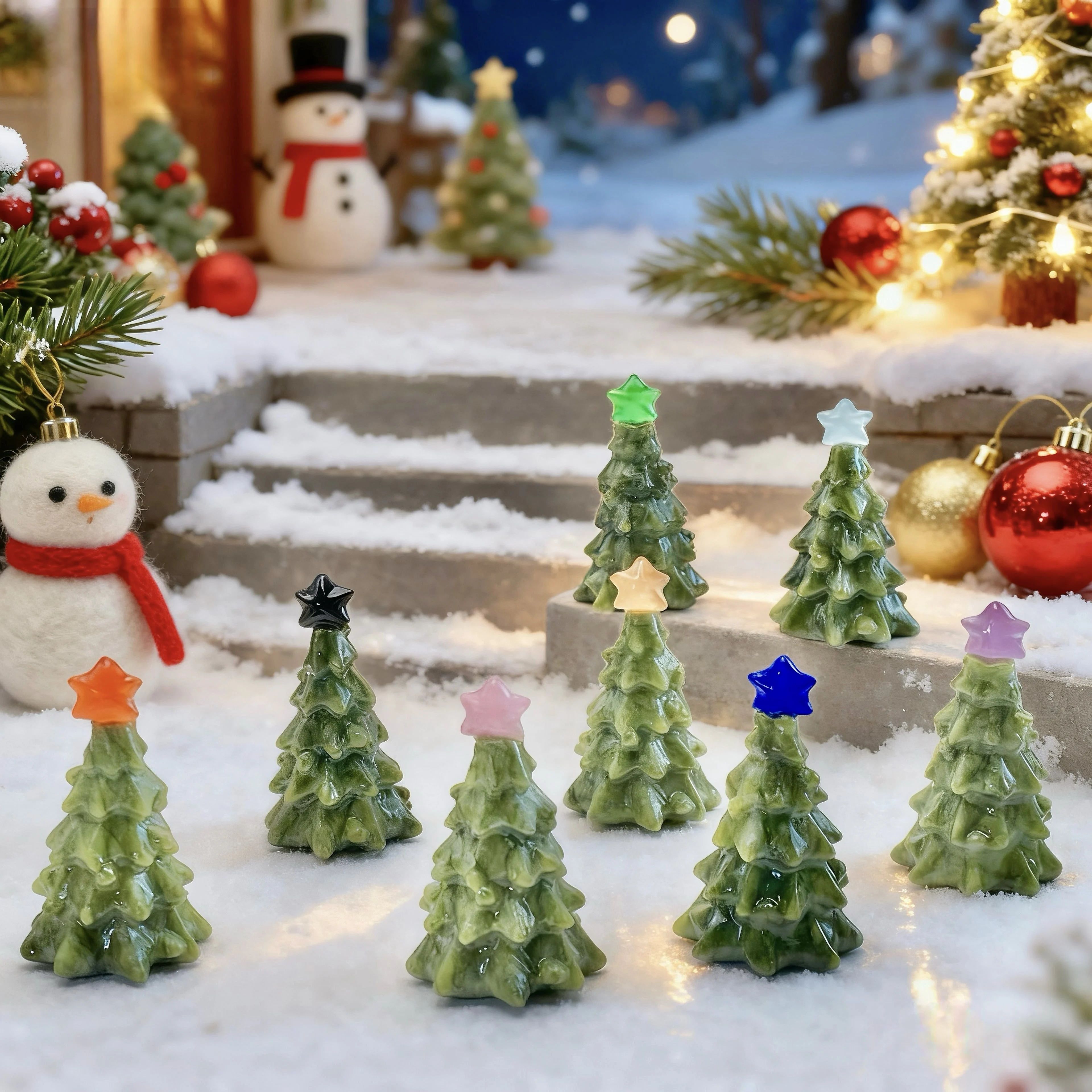 A meticulously carved Christmas tree figurine made from translucent Xiuyan Jade, featuring a smooth surface and characteristic pale green color.