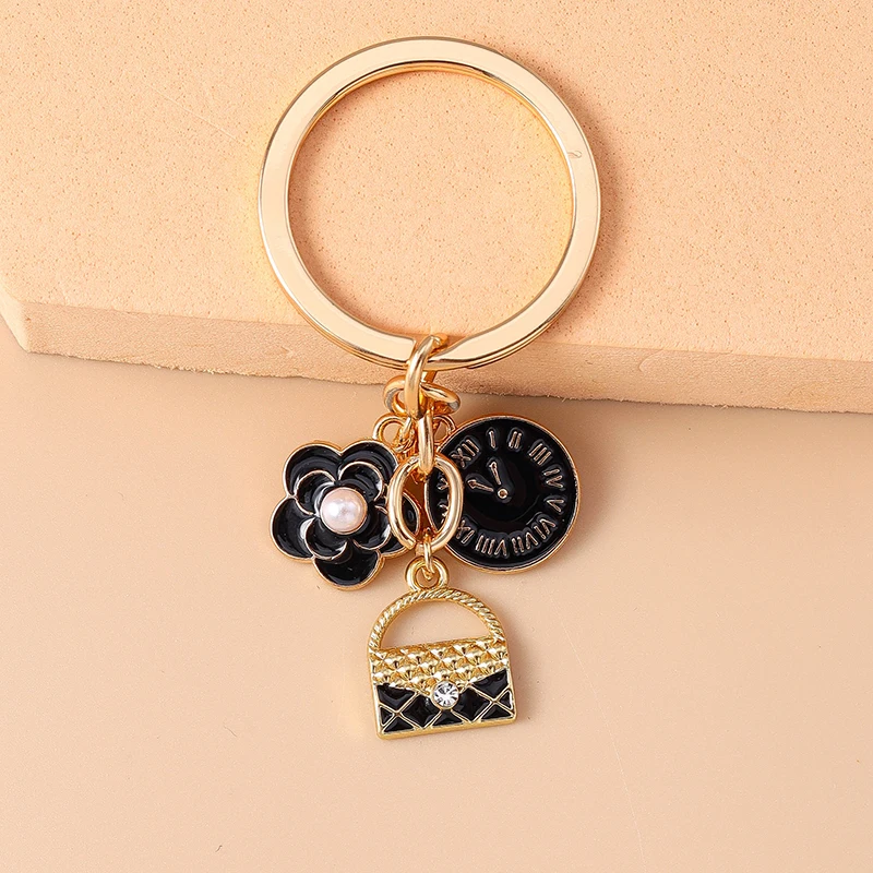 Modische Blumen-Schlüsselanhänger Emaille-Uhr Taschenanhänger Schlüsselringe für Frauen Männer Auto-Schlüssel Handtaschen-Schlüsselketten Zubehör DIY Geschenke