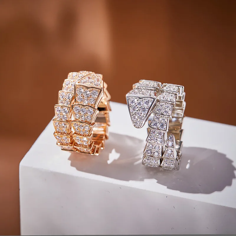 

Designer Collection Style Wide Ring S925 Silver Elastic Paved Full Cubic Zircon Plated Gold Color Double Circle Snake Serpent