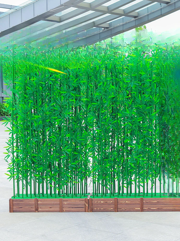 

Simulated bamboo decoration, green plant landscaping, partition, indoor courtyard, plastic background retaining wall