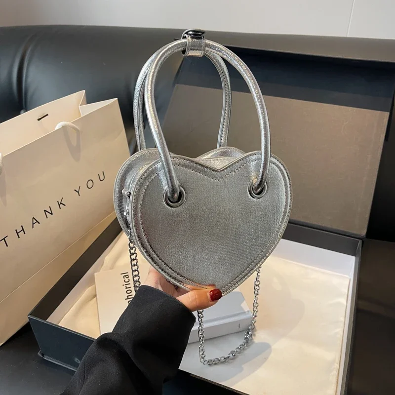 

Трендовые Глянцевые Женские Сумки из искусственной кожи на молнии с верхними ручками, женские сумки на плечо в форме сердца, распродажа 2024, бесплатная доставка, Bolso Mujer