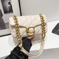 Sac à bandoulière en cuir PU pour filles, sac à main de luxe à chaîne pour femmes, sac de transport léger de marque, sacs carrés à pompons 1