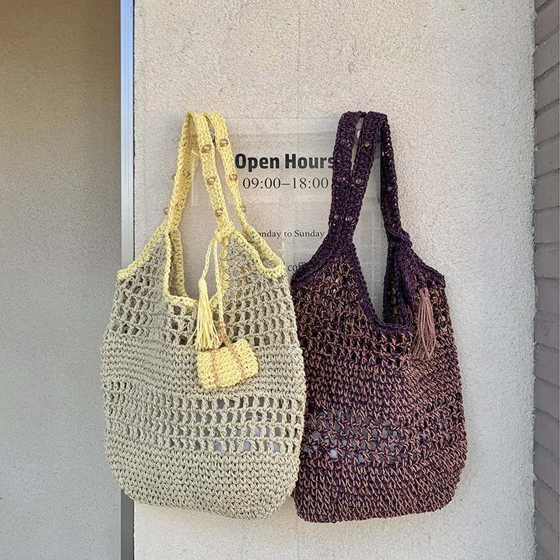 Spring Summer Hollow Woven Handbag Women's Pure Handmade Paper Rope Net Beach Vacation Straw Woven Bag Niche Single Shoulder Bag