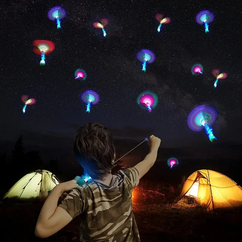 Flying light toy 1/3/5/10pcs amazing light in the dark flying toys LED light indoor outdoor party fun gifts rubber band catapult kids