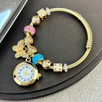 Cross-border Gold Bracelet Watch Adjustable opening Alloy bracelet Quartz Watch Beaded Small flower bracelet Watch 1