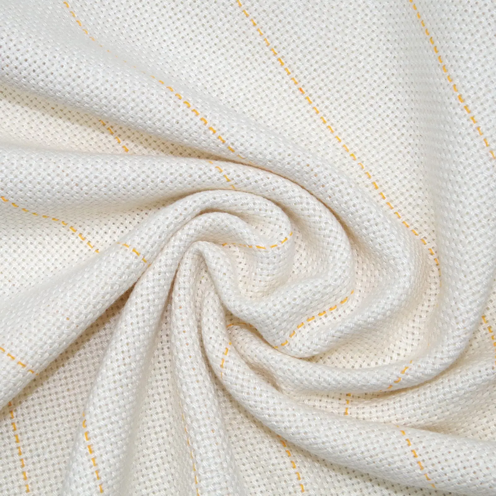 White primary fabric with yellow lines for tufting