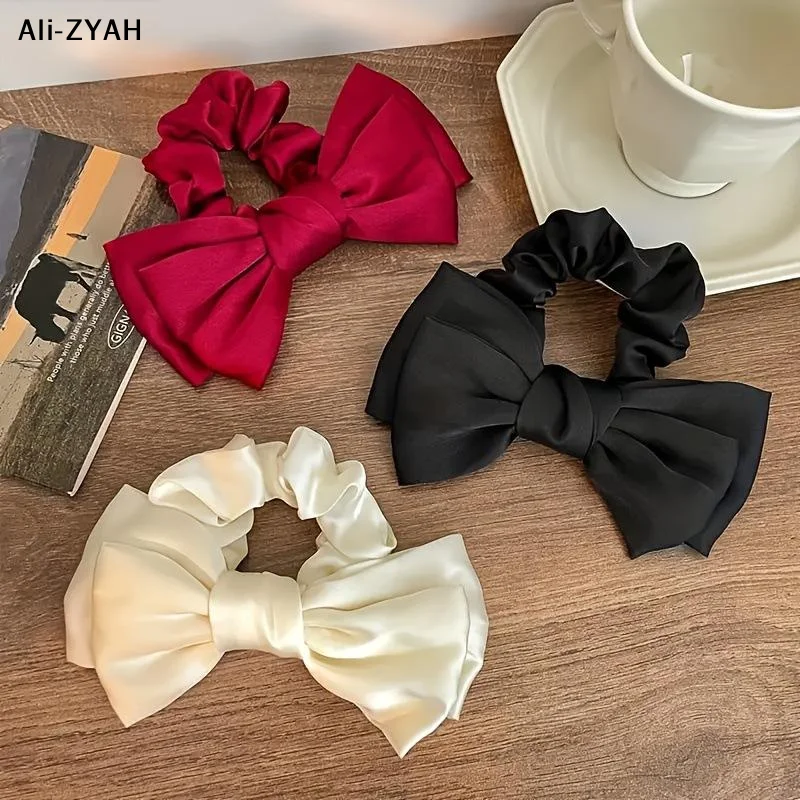 Elegant Satin French Bow Scrunchie - Luxury Textured Hair Accessory