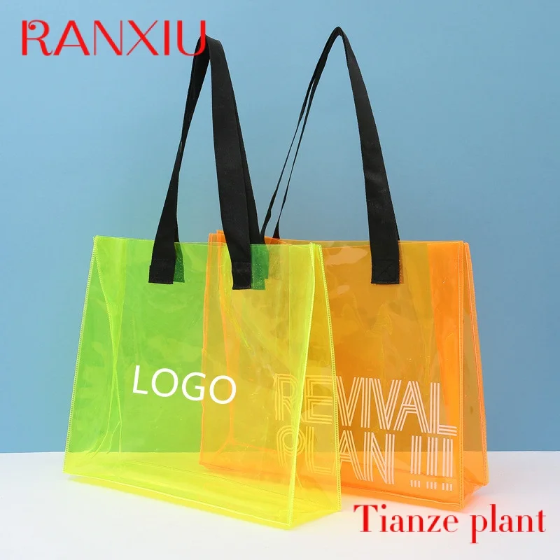 

Custom 2022 Fashion Custom Women Travel Waterproof Beach Bag shopping Bag Transparent PVC Plastic Bag With Black Strap