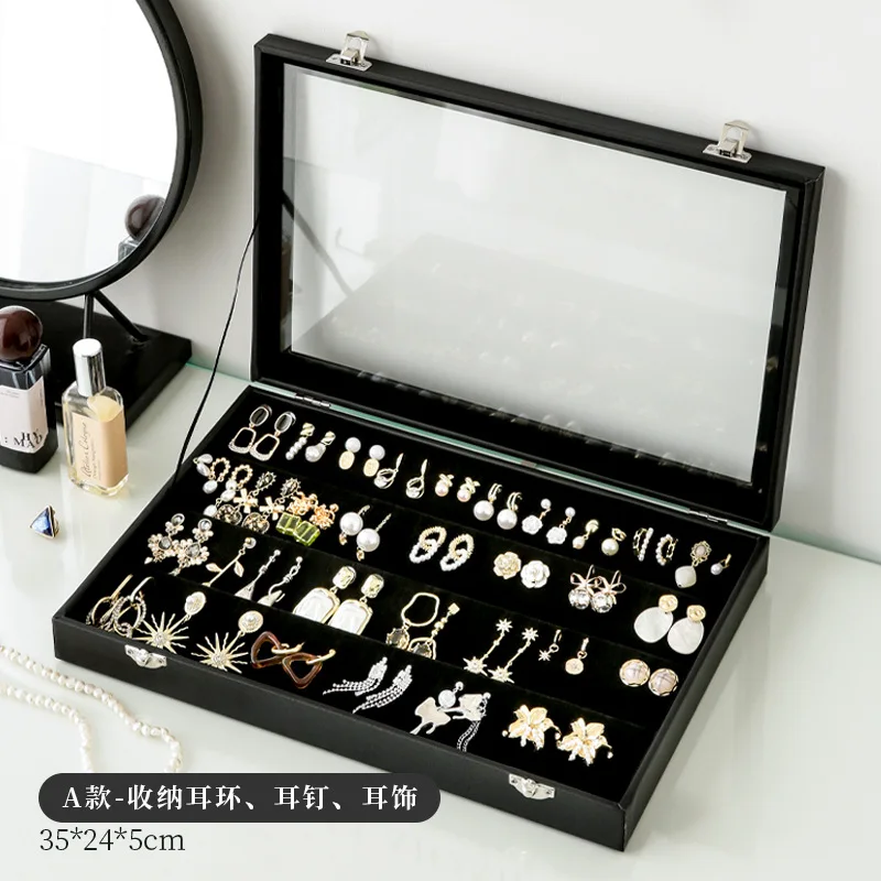 Boîte de boucles d'oreilles noires