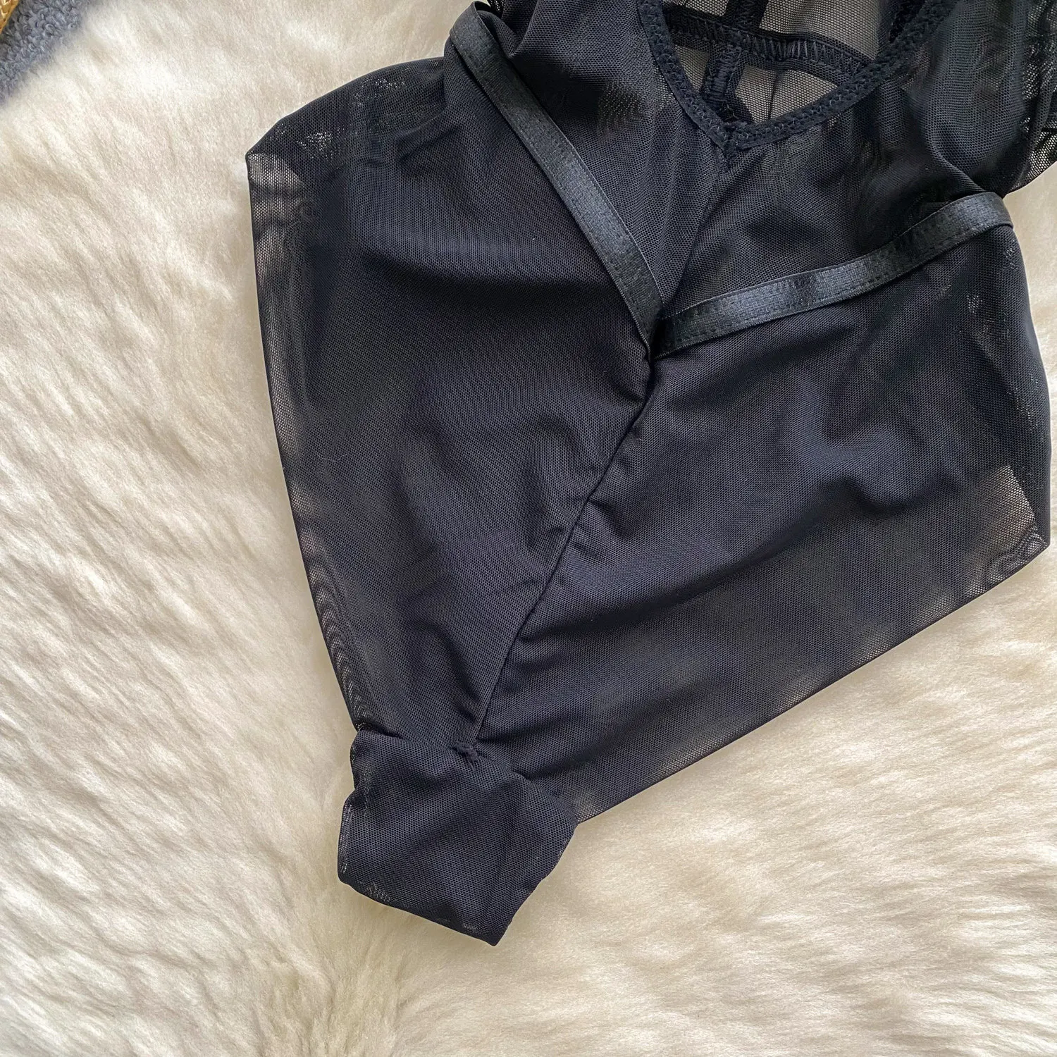 slim fit silhouette of bandage mesh bodysuit