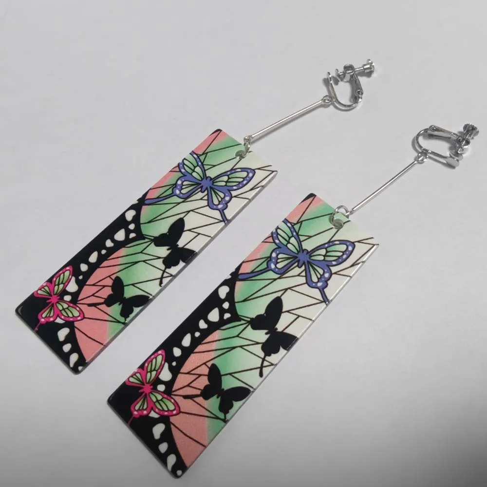 Model showcasing butterfly kimono near beach