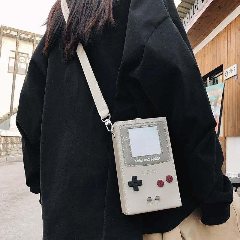 รูปสินค้า กระเป๋าสะพายข้างลายเกมส์ น่ารัก ใส่ได้ทุกโอกาส