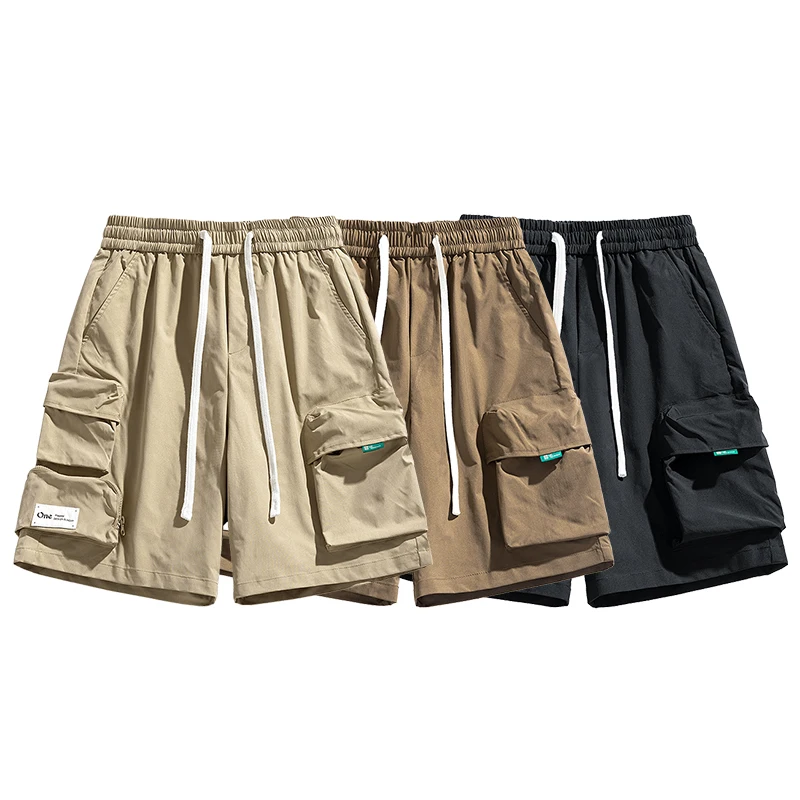 Fashion Spliced Pockets Solid Color Cargo Shorts Men's Clothing 2024 Summer New Loose Elastic Lace Up Solid Color Casual Shorts