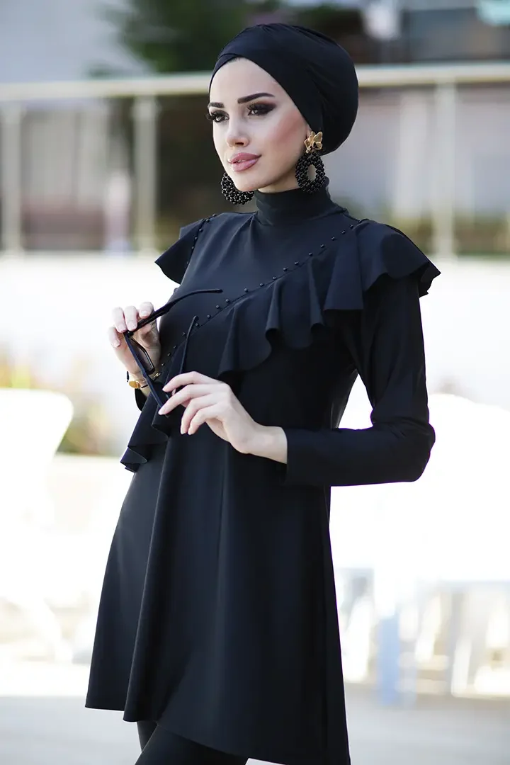 Display of spandex-polyester blend fabric texture on modest swimwear