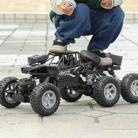 1: 18 Six Wheel Drive RC CAR Cross-country Climbing Spray Racing Car Remote Control Electric Car Fall Resistant Boy Toy Gift 1
