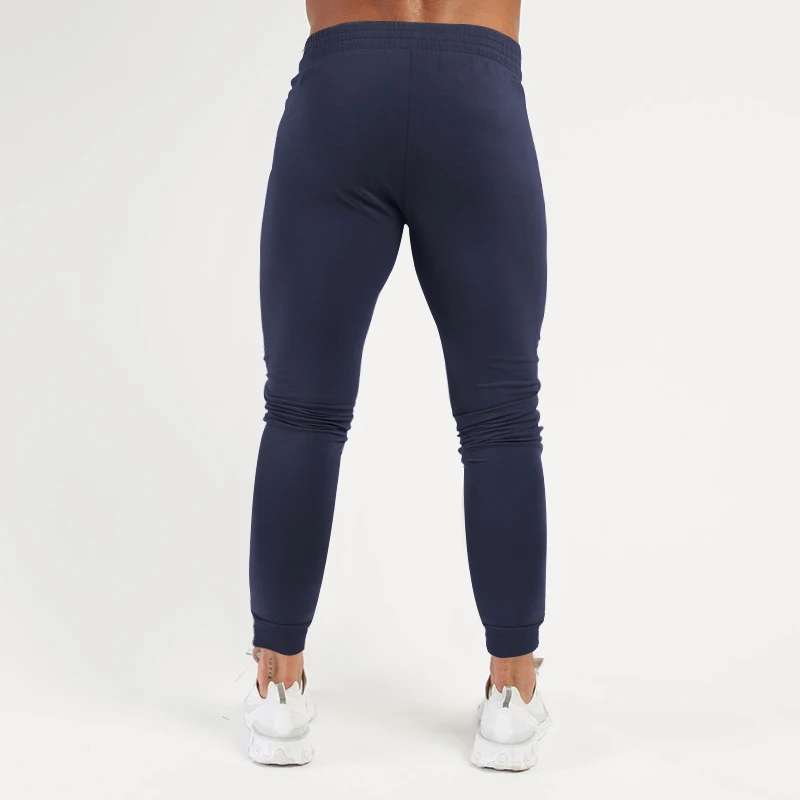Spring Fall Mens Casual Pants Slim Fit Stretch Running Trousers For Men Fashion Pure Color Zipper Pockets Design Training Pants