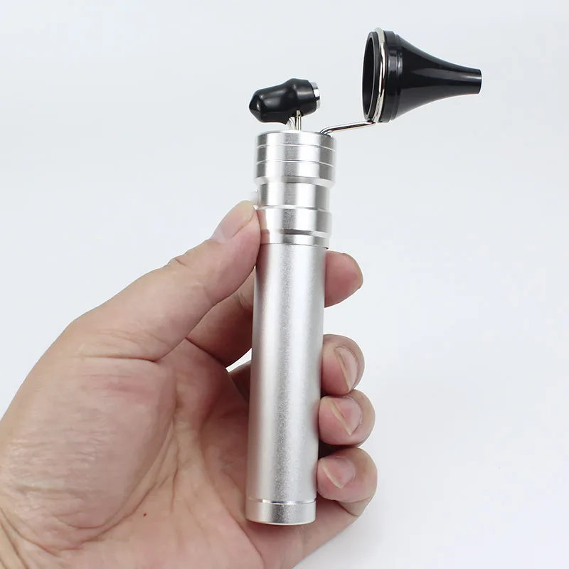 

Ear endoscope in the ear light charging ear light otoscope child holding the light of the amount of ears