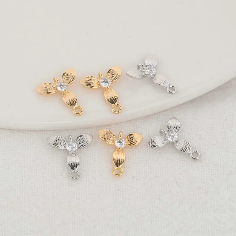 11 14k GOLD CHARMS,2 WITH DIAMONDS