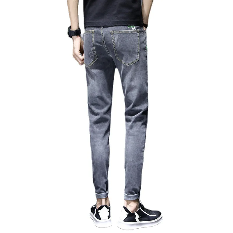 Spring and autumn jeans men's tide brand slim feet trend casual summer thin long pants men's new style in 2022