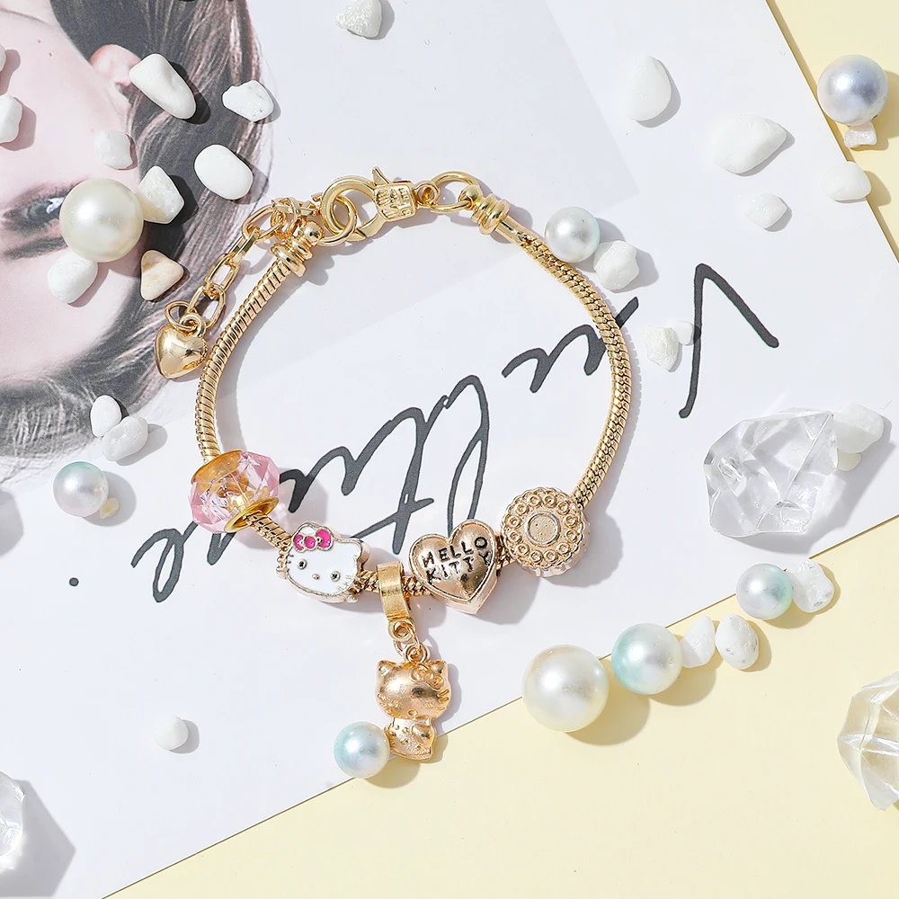 سوار "هيلينا" المطلي بالذهب مع تعليقات "هالو كيتي"...