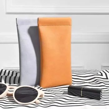 Borsa portaoggetti per occhiali in morbida pelle PU alla moda Custodia per occhiali da sole Custodia protettiva impermeabile portatile Portamonete per rossetto cosmetico