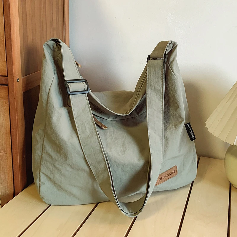 Men's and women's large capacity crossbody bags, shoulder bags, suitable for different occasions, campus, travel, office