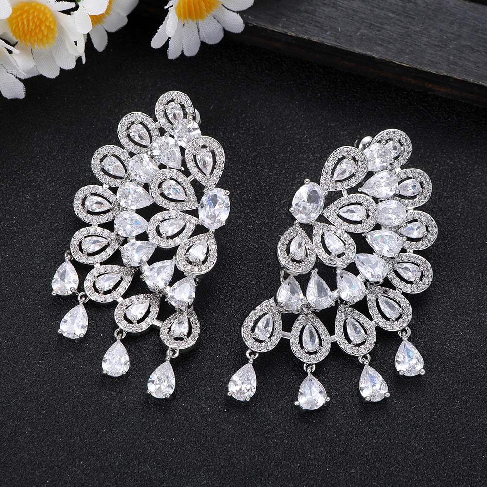 زوج واحد من أقراط متدلية على شكل طاووس كريستال زمر...