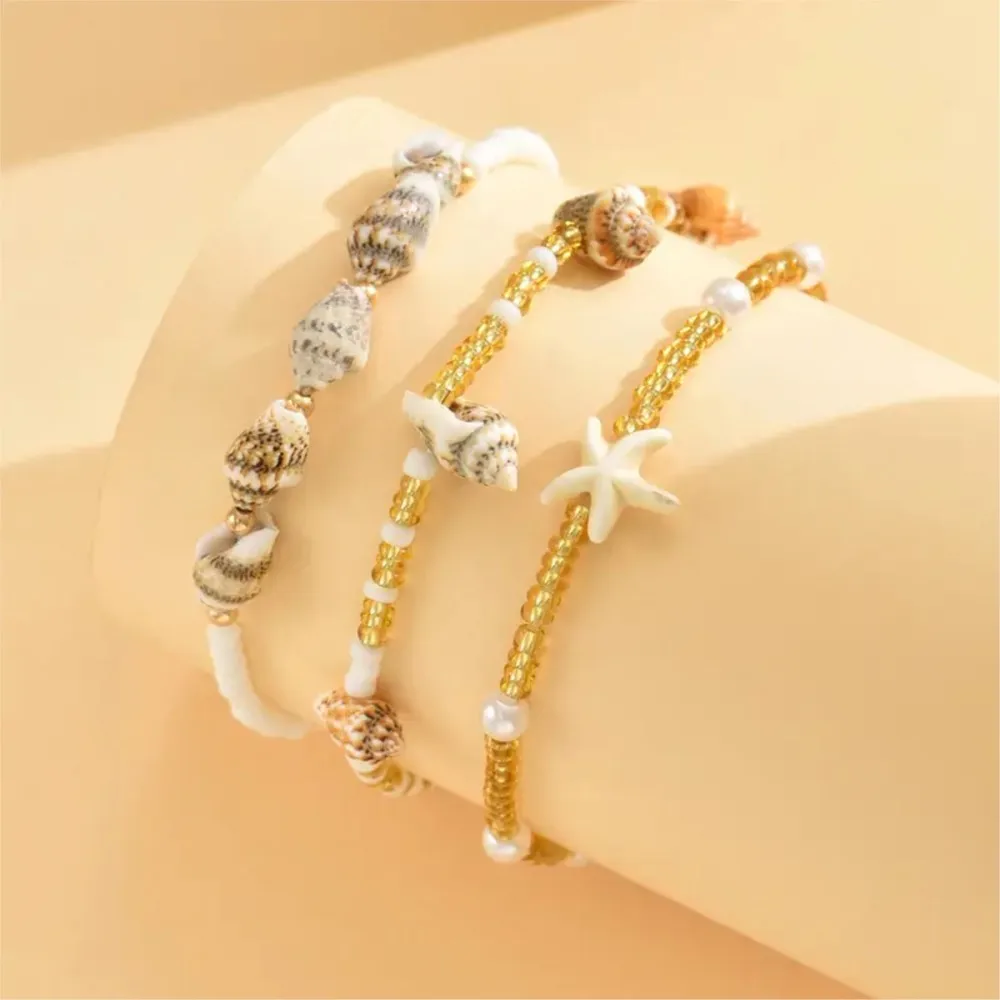 3 Pack Bohemian Layered Anklet for Women Golden-Tone Seashell&Starfish Charm Foot Jewelry Ideal for Beach Hawaiian Vacations