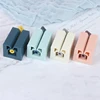1Pc Bathroom Kitchen Squeeze Tube Squeezer Easy Plastic Press Toothpaste Dispenser 2