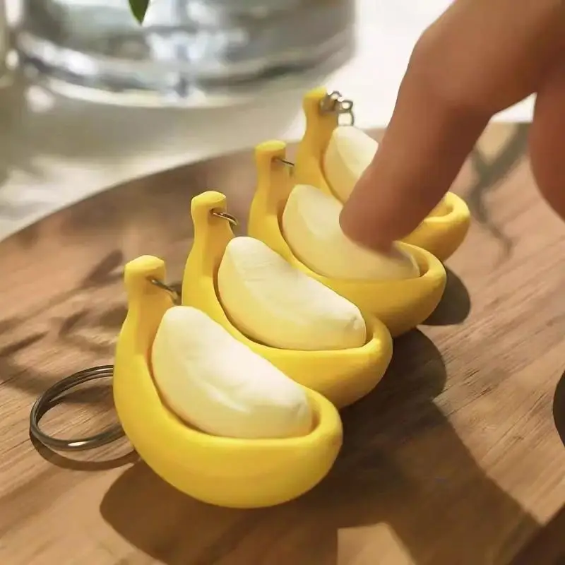 1 Stück 3D-Druck Bananen-Fidget-Schlüsselanhänger Mechanischer Schalter Klicker Fidget-Spielzeug Tragbarer Stressabbau-Quetschschlüsselring Neuartiges Geschenk