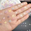 50pcs Transparent Bow Nail Art Parts Charms Bulk Shiny Mini Resin Ribbon Nail Rhinestones DIY Summer Nail Art Decor Accessories 1