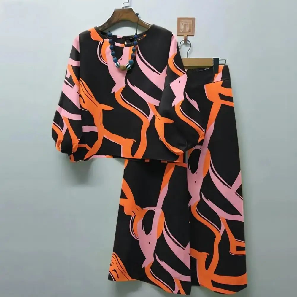 

Женский винтажный костюм с цветочным принтом, блузка с рукавом 3/4 и широкие брюки