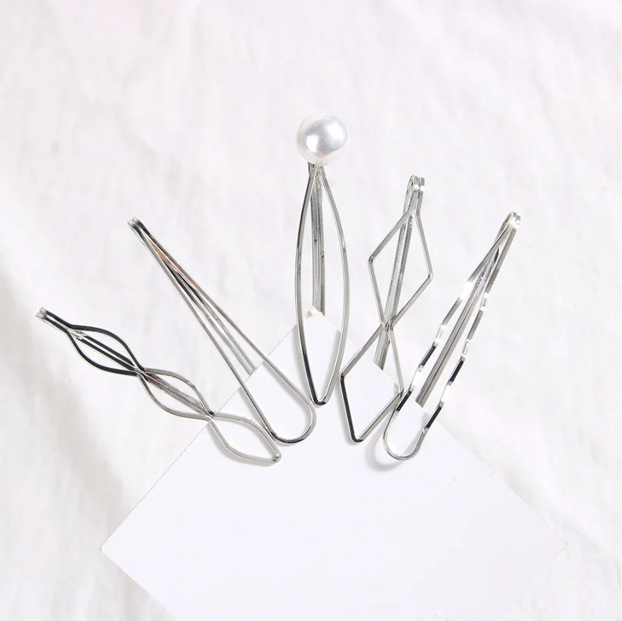 Conjunto de pregadeiras de cabelo douradas presilhas onduladas_voghion.com