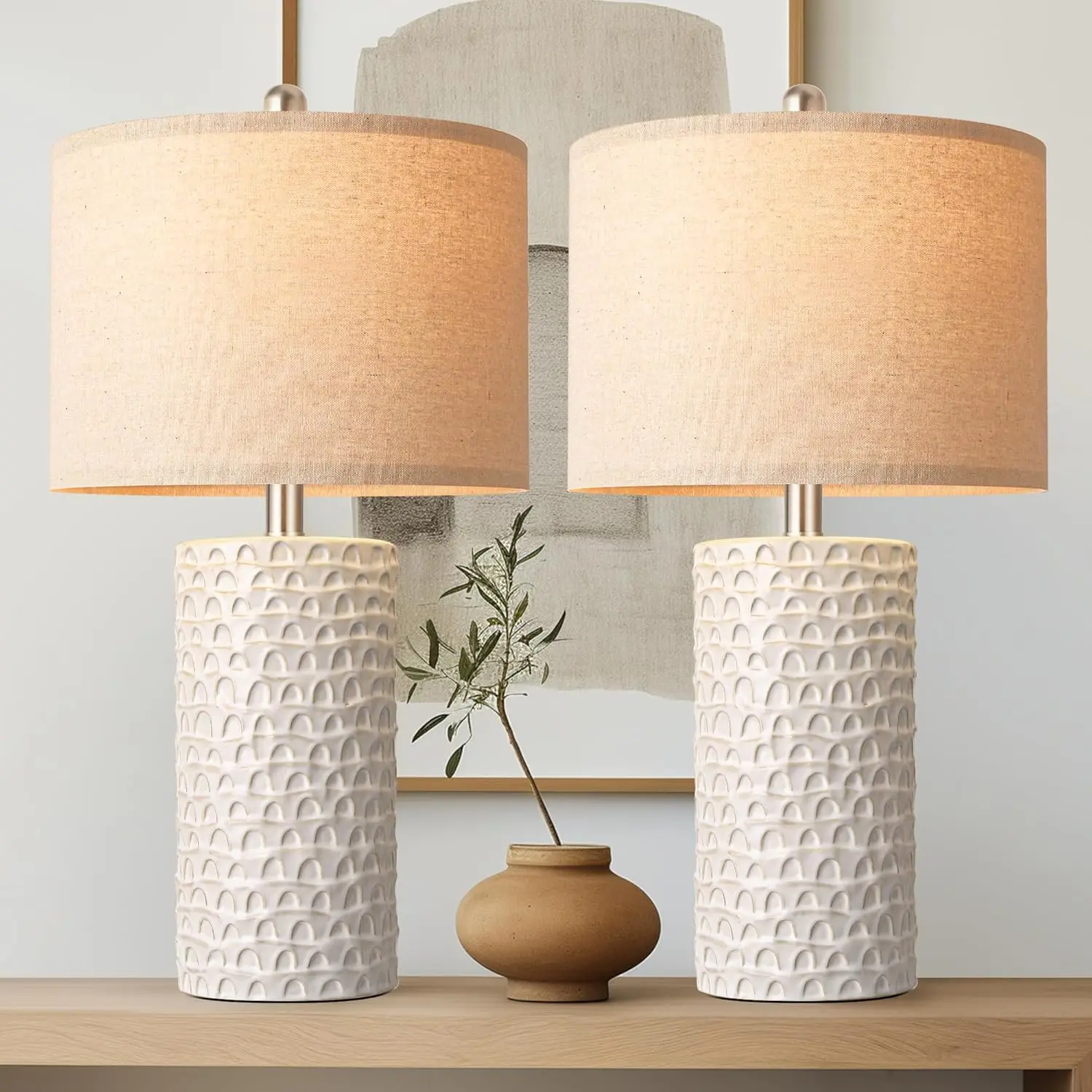 Modern ceramic table lamp pair on a side table