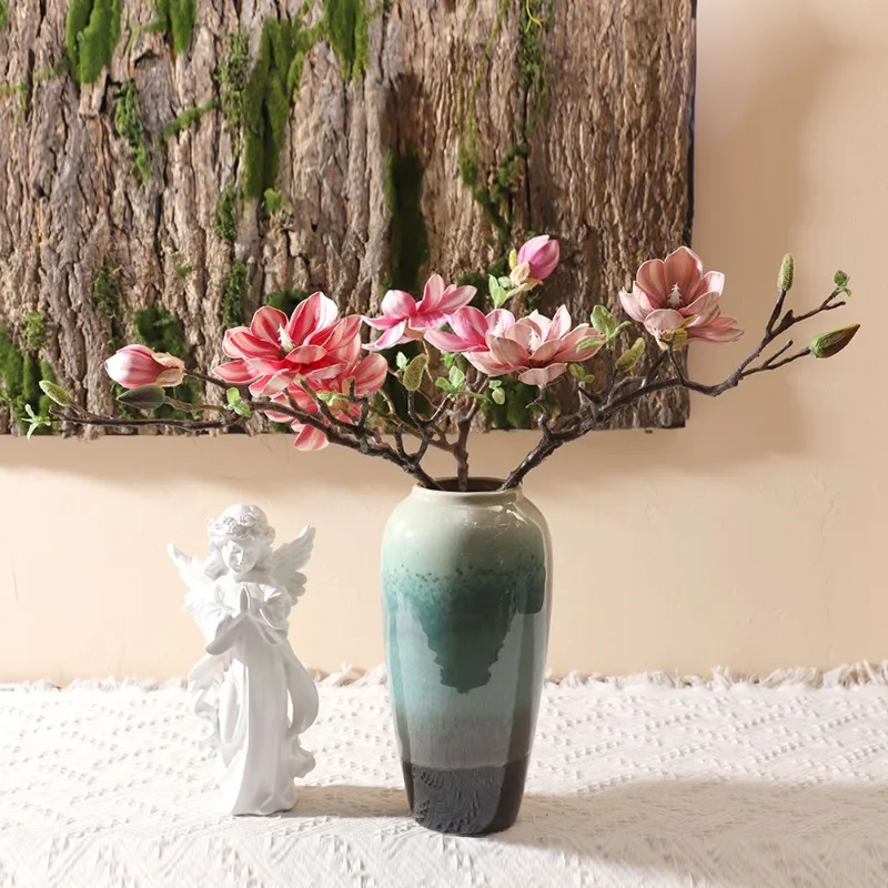 

High-simulation multi-head hand-painted magnolia home soft decoration artificial flower hotel decoration simulation orchid spot.