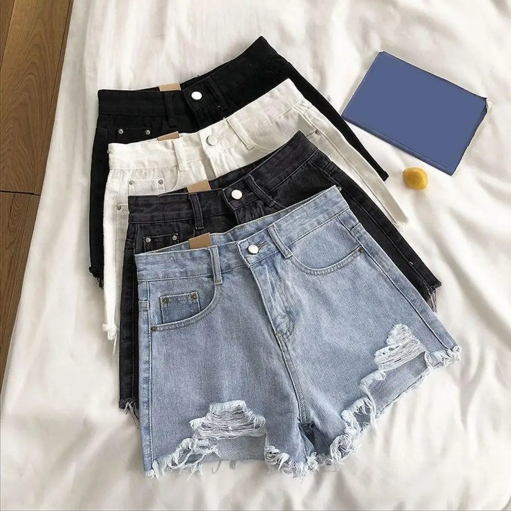 Vintage high-waisted denim shorts for women, vintage style, ripped jeans, slim fit, high waist, small, summer.