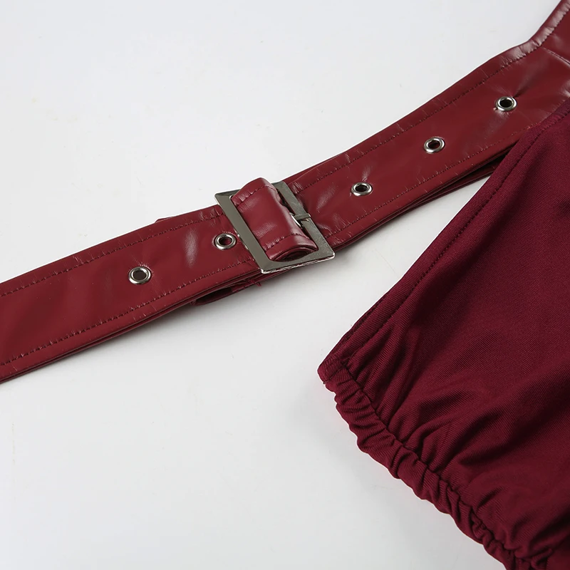 Faldas fruncidas de cuero sólido con cinturón de PU y metal empalmado para mujer, diseño irregular, minifaldas navideñas, sexys y sólidas, Gyaru