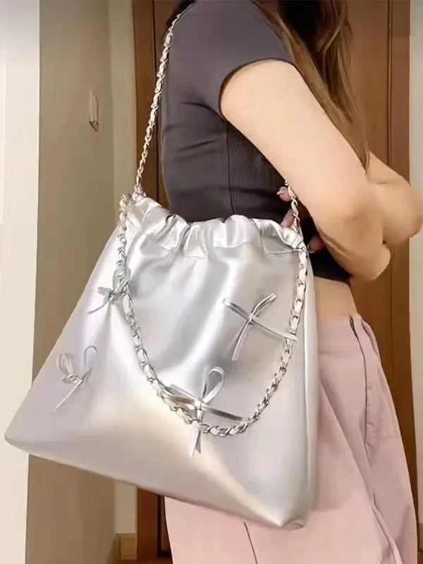 2023 New Girls' Soft Leather Cute One Shoulder Student Bag One Shoulder Large Capacity Versatile Commuter Bag Bow