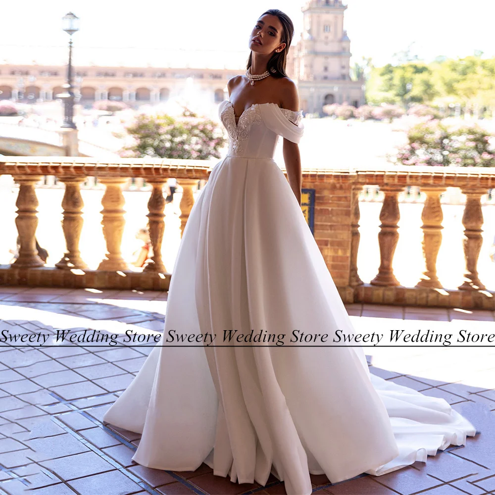 

Sexy Off The Shoulder V Neck Organza Wedding Dresses Beading Applique Pearls A Line Robe De Mariee Sweep Train Bridal Gowns