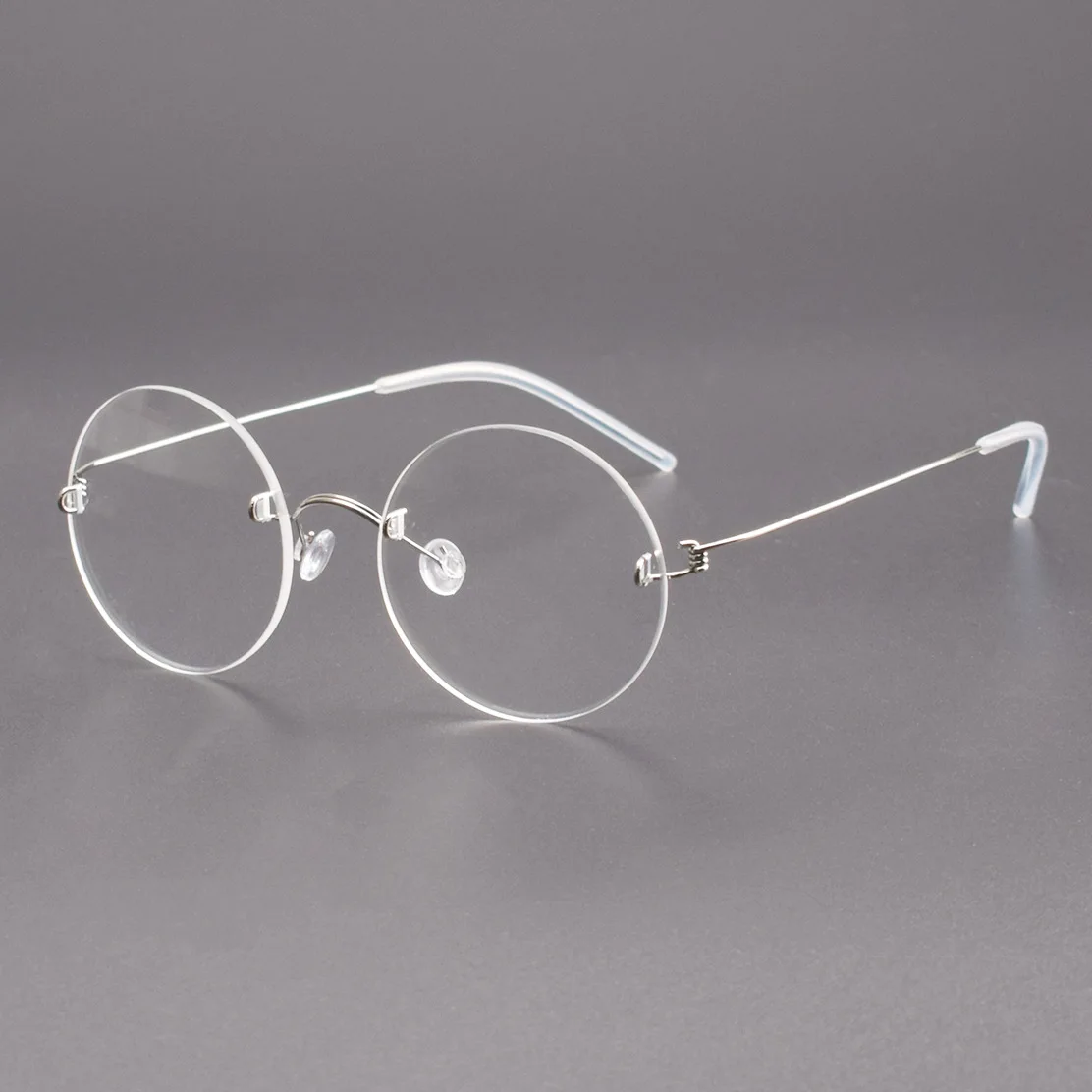 

Retro Elegant Celebrity Fashion Eyeglasses Alloy Frameless Handmade Men Eyewear No Screw Round Frame Optical Myopia Eyewear