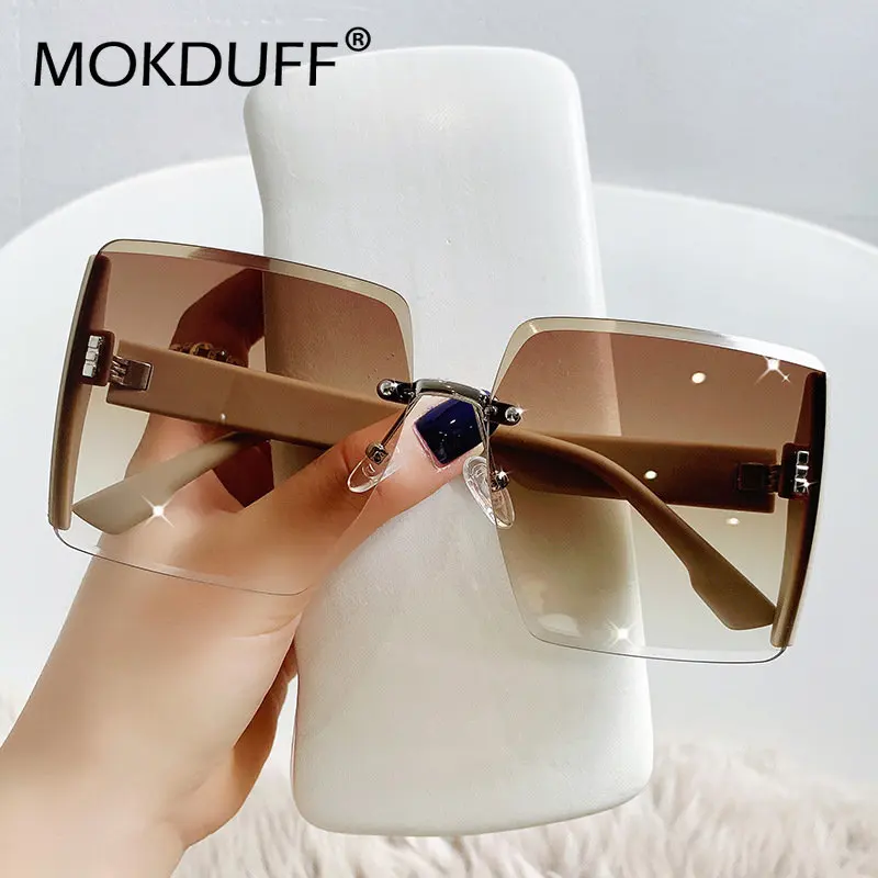 

2022 New Fashion Luxury Sunglasses Female Anti-UV400 Frameless Trimming Sunglasses Women Oversized Rimless Shades